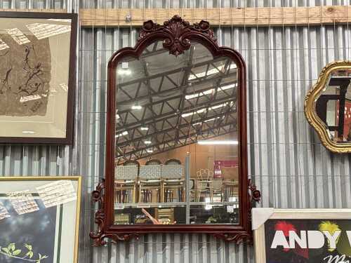 Carved mahogany wall mirror
