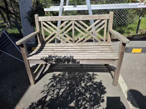 Two seater wooden outdoor seat