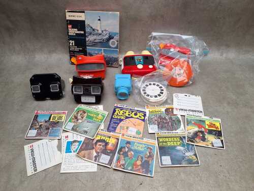 Collection of View-Master stereo viewers and reels