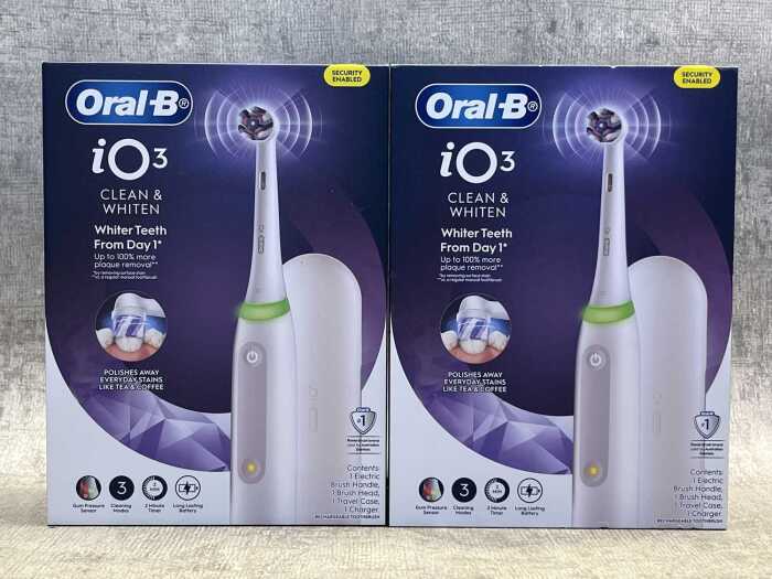 Two Oral B iO3 electric toothbrushes