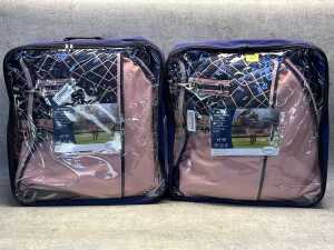 Two Caribu Alpine Detach-A-Neck horse jackets
