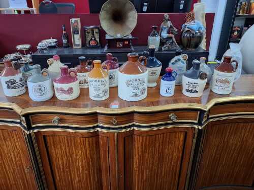 Assorted ports in earthenware flagons