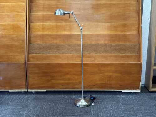 Lucci floor lamp with adjustable arm and brushed chrome finish
