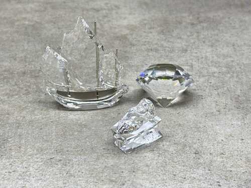 Three Swarovski Crystal figures, including Chinese Sailing Junk