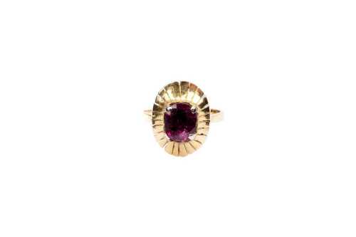 A ruby ring in 18 carat yellow gold