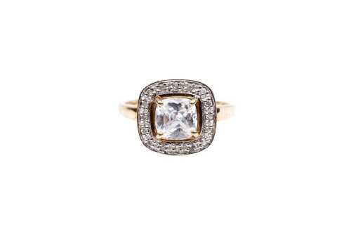 A cubic zirconia ring in 9 carat yellow gold