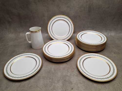 Royal Doulton porcelain plates with gilt decoration and wreath design