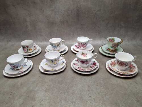 Eight porcelain trios including Duchess