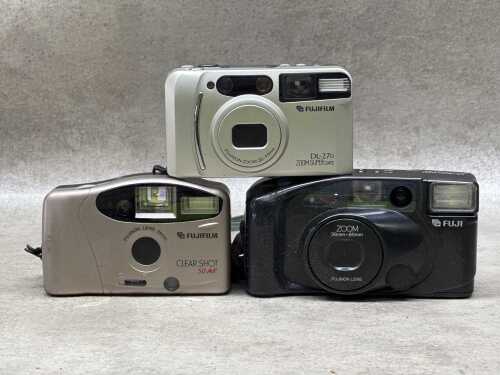 Three Fujifilm point and shoot 35mm film cameras