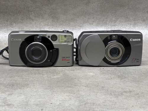 Two Canon Sure Shot point & shoot 35mm film cameras
