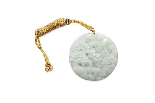 A carved Jade pendant
