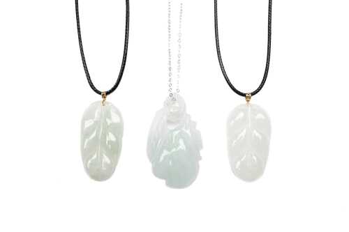 Three carved jade necklaces