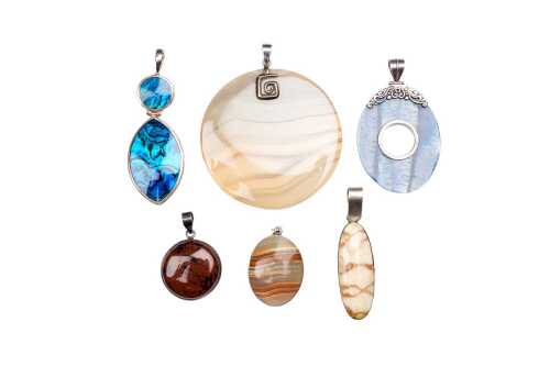 Six agate and shell pendants in sterling silver