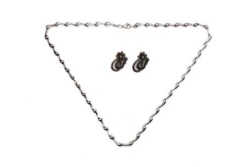 A necklace and marcasite earrings in sterling silver