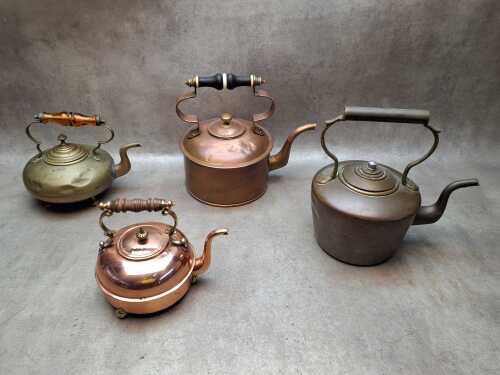 Four copper and brass kettles including three antique