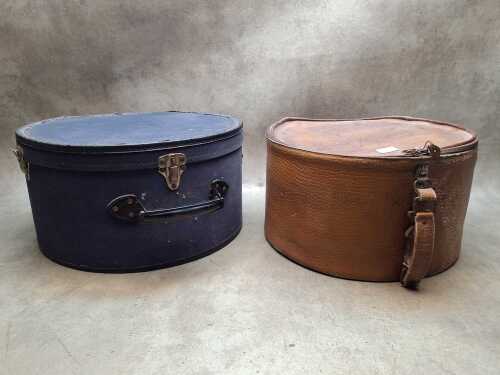 Two round hat cases