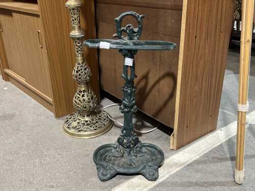 Cast iron umbrella stand in dark green