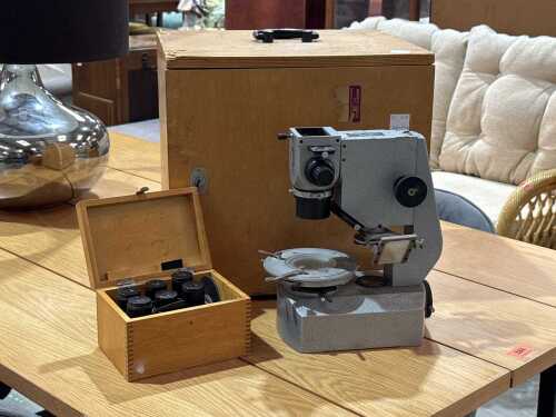 Scientific microscope with lenses and storage case