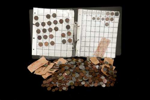 A large group of assorted world coins.