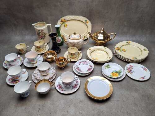 Mainly English porcelain including Queen Anne trios, Sadler teapot, Royal Winton gold glazed tea set, etc
