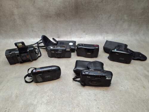 Six Kodak compact 35mm film cameras