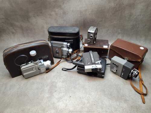 Five movie cameras
