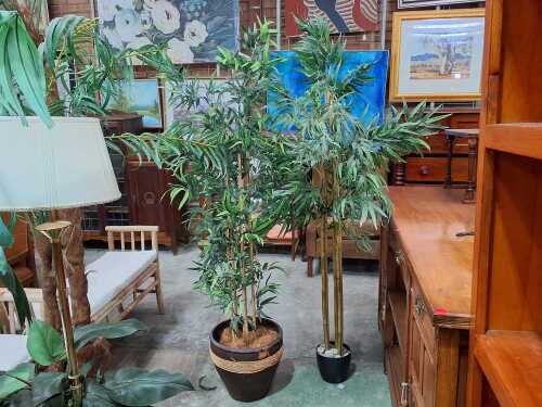 Two potted faux plants