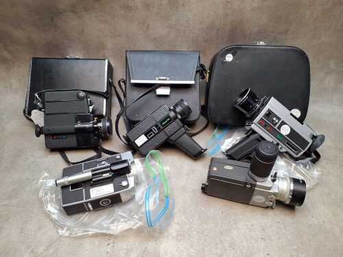 Five 8mm movie cameras