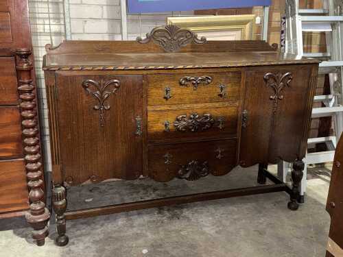 Early 20th century oak sideboard with carved drawer pulls