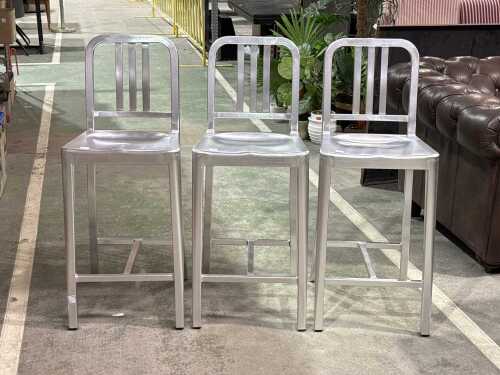 Trio of aluminium bar stools