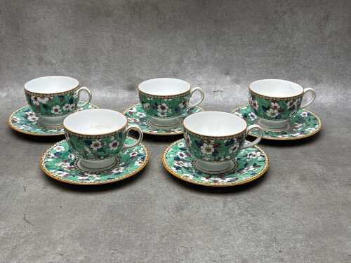Five Wedgwood porcelain teacups and saucers