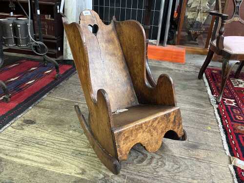 Antique elm baby's rocking chair