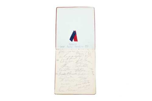 Vintage autograph book with illustrations and inscriptions