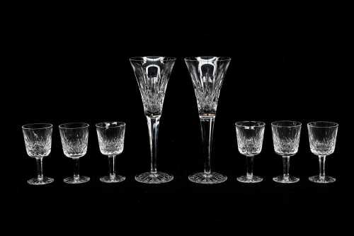 Eight Waterford Lismore cut crystal glasses including 6x sherry and 2x champagne flutes