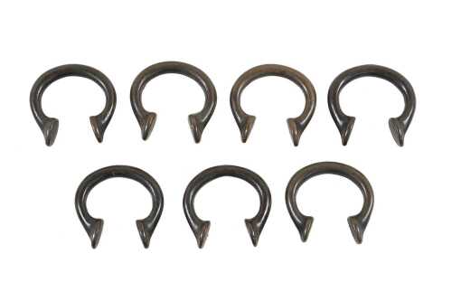 Seven antique African bronze Manillas