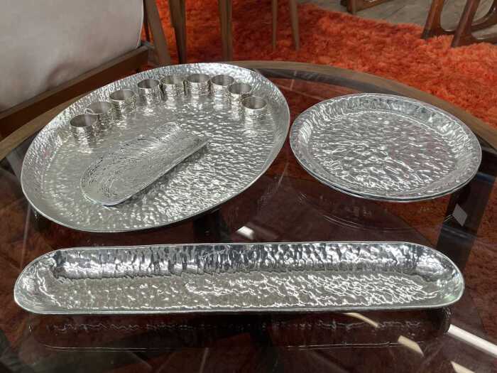 Mainly Don Shiel aluminium servingware, including platter, dishes, napkin rings, etc.