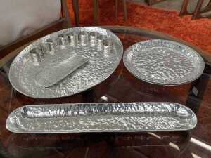 Mainly Don Shiel aluminium servingware, including platter, dishes, napkin rings, etc.