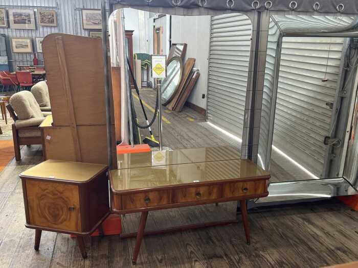 Mid-century blackwood and figured walnut dressing table