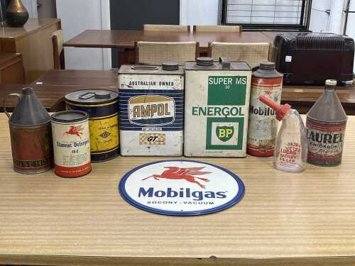 Collection of mainly vintage motor oil tins and garagenalia