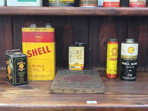 Vintage Shell oil tins and garagenalia