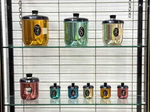 Set of Jason anodised aluminium cooking and spice cannisters in graduated sizes