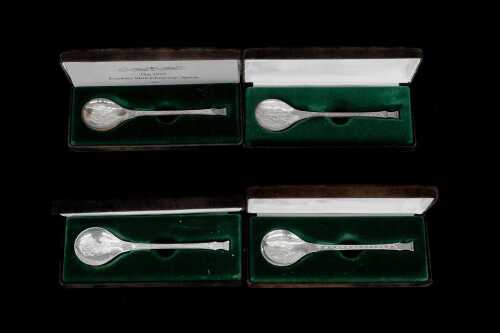 Four Franklin Mint English sterling silver Christmas spoons, weight 120g