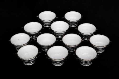 Set of 12 American soup coupes with sterling silver holders, weight of silver 816g