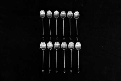 Set of 12 antique English sterling silver coffee spoons, total weight 95g