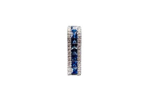 A sapphire and diamond pendant in 14 carat white gold