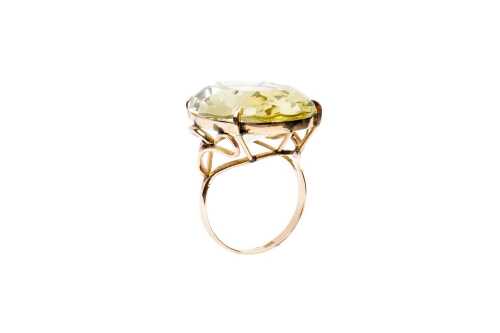 A citrine ring in 14 carat yellow gold