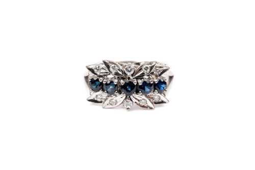 A vintage sapphire and diamond ring in 14 carat white gold