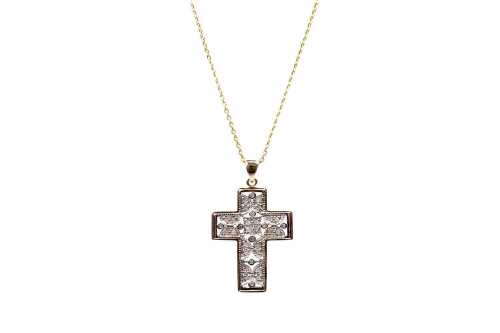 A diamond cross and necklace in 9 carat yellow gold