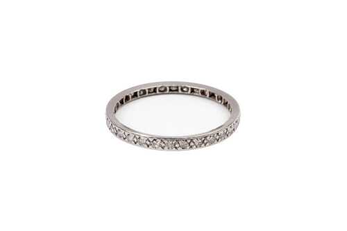 A fully set diamond band in 18 carat white gold