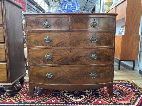 Georgian mahogany bow front chest of five drawers
